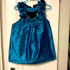 Blue taffeta racer back blouse with flower neckline